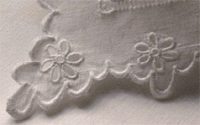 English cutwork with scallop border