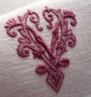 embroidered red monogram vu