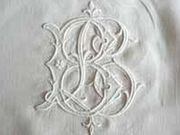 white embroidered monogram bl